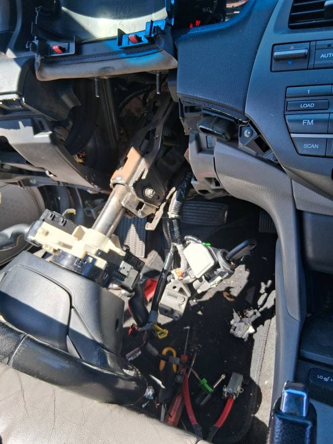 Mobile mechanic performing electrical inspection at customer's home